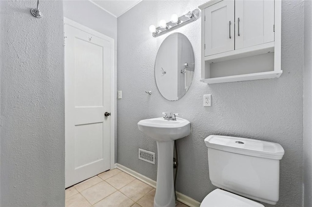 7617 W 63rd Ter, Overland Park, KS 66202 - bathroom featuring toilet and tile patterned flooring