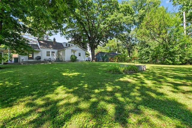 7617 W 63rd Ter, Overland Park, KS 66202 - view of green lawn