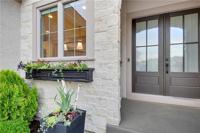2144 W 89th Ter, Leawood, KS 66206 - entrance to property with stone siding and french doors