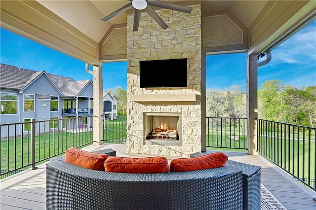 2144 W 89th Ter, Leawood, KS 66206 - wooden terrace featuring ceiling fan, a lawn, and an outdoor living space with a fireplace