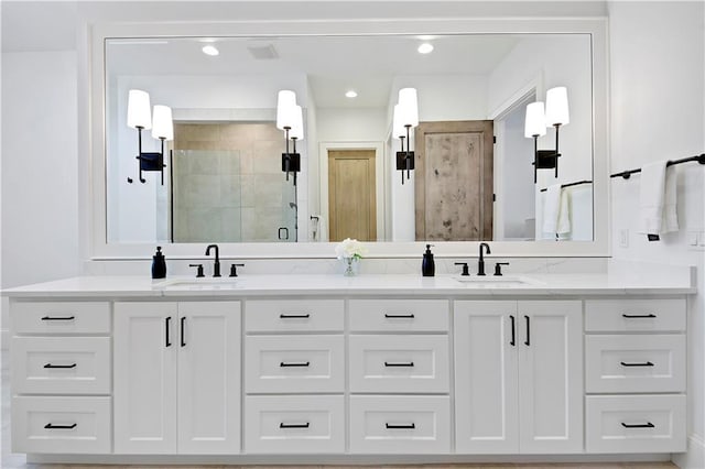 2144 W 89th Ter, Leawood, KS 66206 - full bathroom with double vanity, a shower stall, and recessed lighting