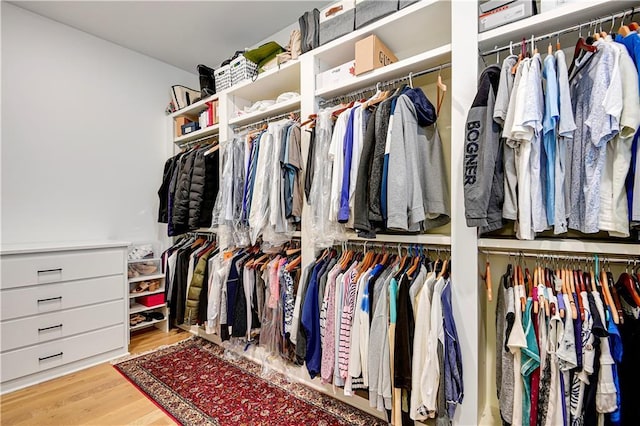 2144 W 89th Ter, Leawood, KS 66206 - walk in closet with wood finished floors