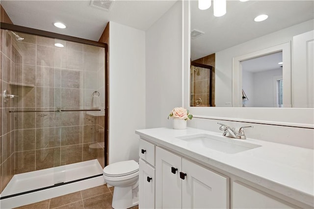 2144 W 89th Ter, Leawood, KS 66206 - full bath featuring vanity, tile patterned flooring, a stall shower, and recessed lighting