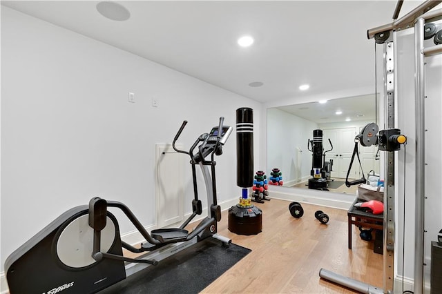 2144 W 89th Ter, Leawood, KS 66206 - exercise area with wood finished floors and recessed lighting