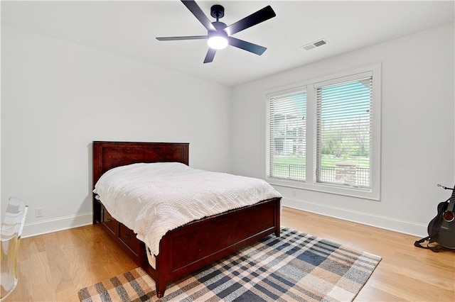 2144 W 89th Ter, Leawood, KS 66206 - bedroom featuring wood finished floors and ceiling fan