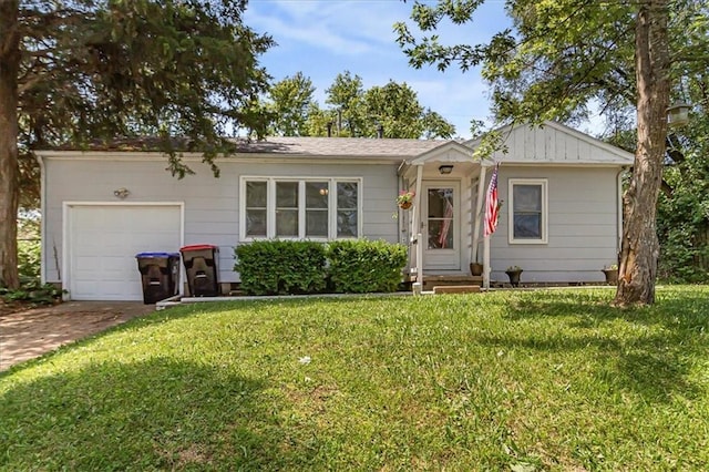 810 Vest Dr, Warrensburg, MO 64093 - ranch-style home featuring a garage, concrete driveway, a front lawn, and entry steps