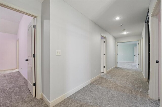 9332 W 158th St, Overland Park, KS 66221 - hallway featuring light colored carpet and recessed lighting