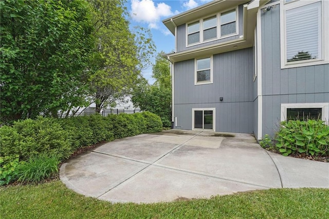 9332 W 158th St, Overland Park, KS 66221 - view of side of property with a patio area