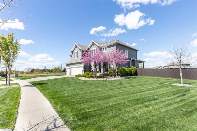 25096 W 87th St, Lenexa, KS 66227 - view of front of property with an attached garage and concrete driveway