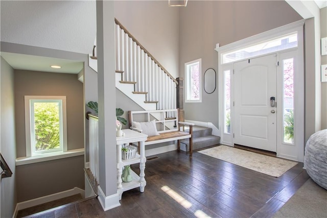 25096 W 87th St, Lenexa, KS 66227 - foyer entrance with a high ceiling, hardwood / wood-style floors, and stairs