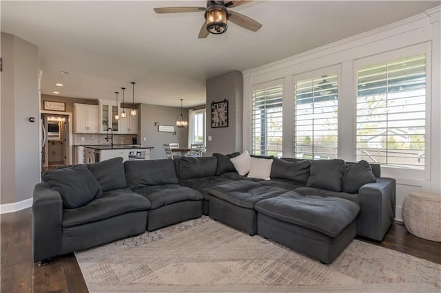 25096 W 87th St, Lenexa, KS 66227 - living room featuring dark wood-type flooring, a ceiling fan, and recessed lighting