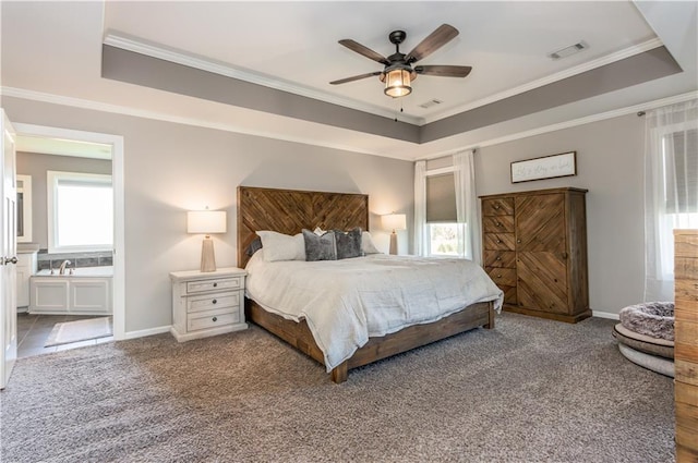 25096 W 87th St, Lenexa, KS 66227 - bedroom featuring a tray ceiling, crown molding, and carpet