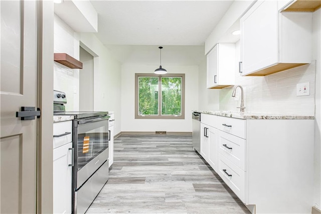 804 NW N Summit Cir, Blue Springs, MO 64015 - kitchen with appliances with stainless steel finishes, light stone countertops, white cabinets, and backsplash