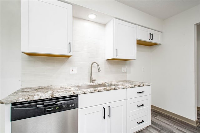 804 NW N Summit Cir, Blue Springs, MO 64015 - kitchen featuring stainless steel dishwasher, light stone countertops, light wood finished floors, and white cabinets