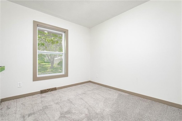 804 NW N Summit Cir, Blue Springs, MO 64015 - carpeted spare room featuring baseboards