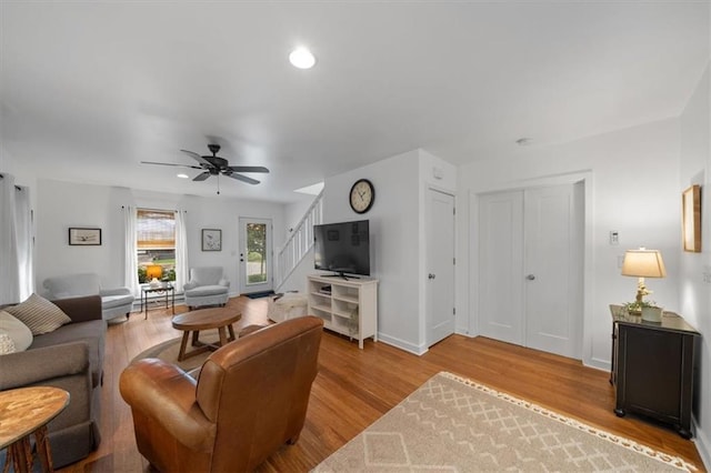 2017 W 48th St, Westwood, KS 66205 - living room with stairway, wood finished floors, a ceiling fan, and recessed lighting