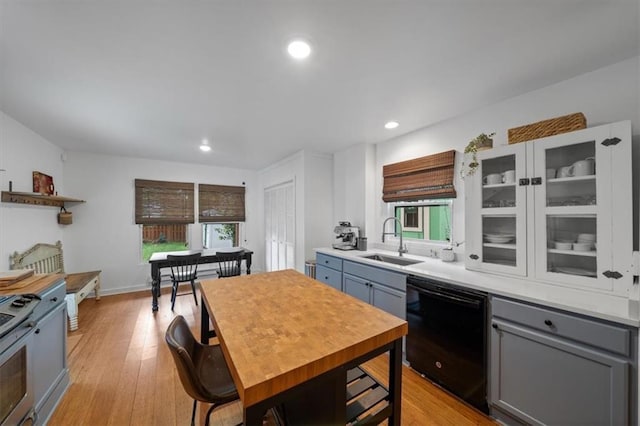 2017 W 48th St, Westwood, KS 66205 - kitchen featuring black dishwasher, gray cabinets, electric range, light countertops, and light wood finished floors