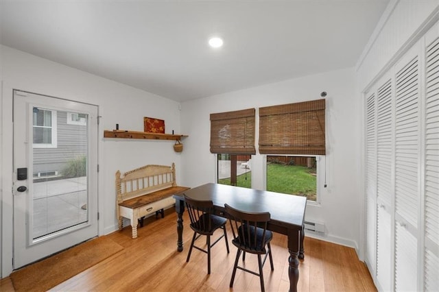 2017 W 48th St, Westwood, KS 66205 - dining space with baseboard heating, light wood-style flooring, and recessed lighting