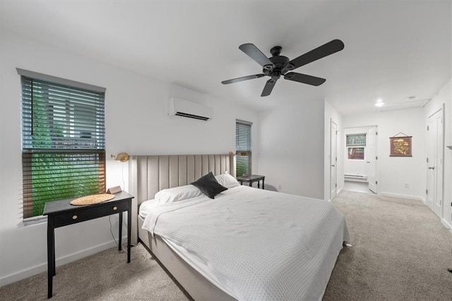 2017 W 48th St, Westwood, KS 66205 - carpeted bedroom with a wall mounted AC, a baseboard heating unit, and ceiling fan