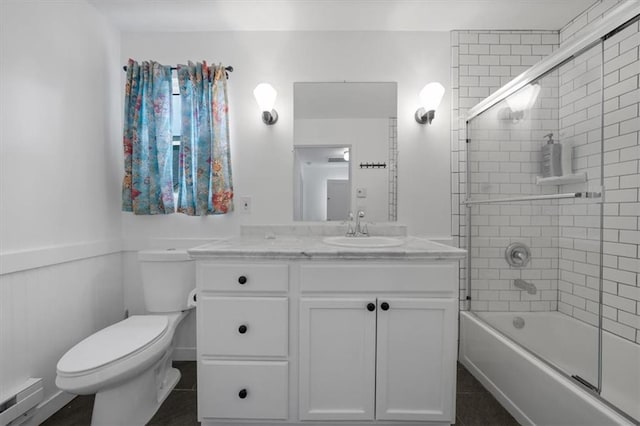 2017 W 48th St, Westwood, KS 66205 - bathroom featuring vanity, enclosed tub / shower combo, tile patterned flooring, and a baseboard heating unit