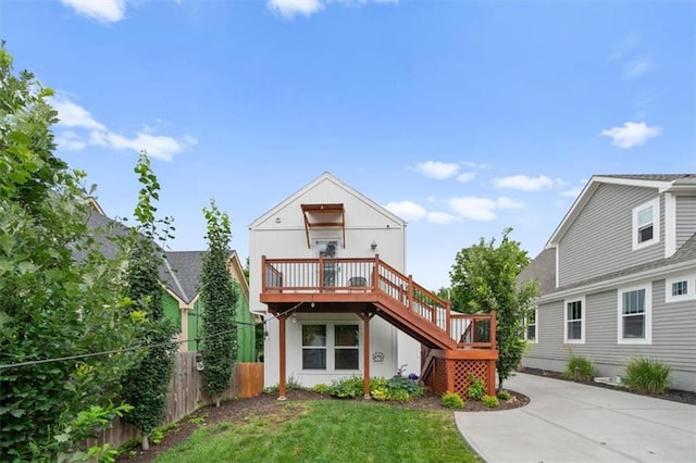 2017 W 48th St, Westwood, KS 66205 - view of front facade with stairway and a wooden deck