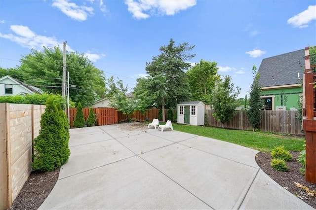 2017 W 48th St, Westwood, KS 66205 - fenced backyard featuring a patio area and a shed