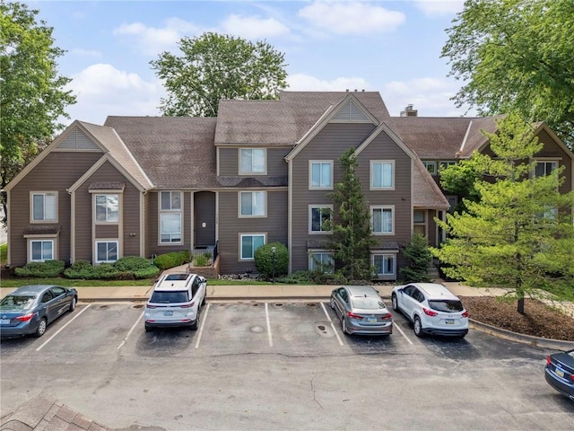 11224 Nieman Rd Unit 302, Overland Park, KS 66210 - view of front facade featuring uncovered parking