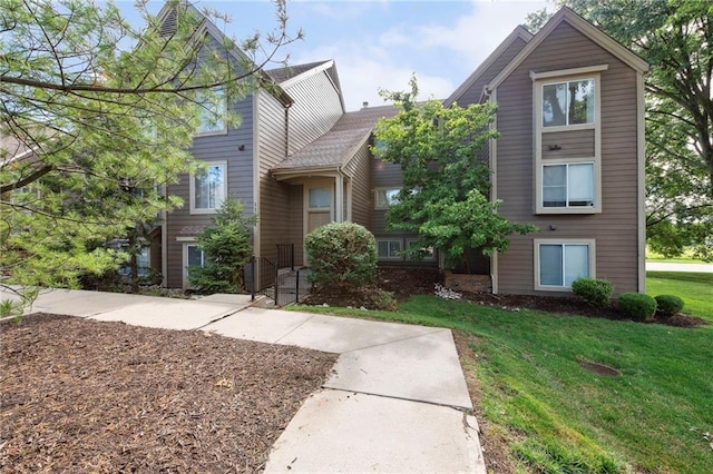 11224 Nieman Rd Unit 302, Overland Park, KS 66210 - view of front of home with a front yard