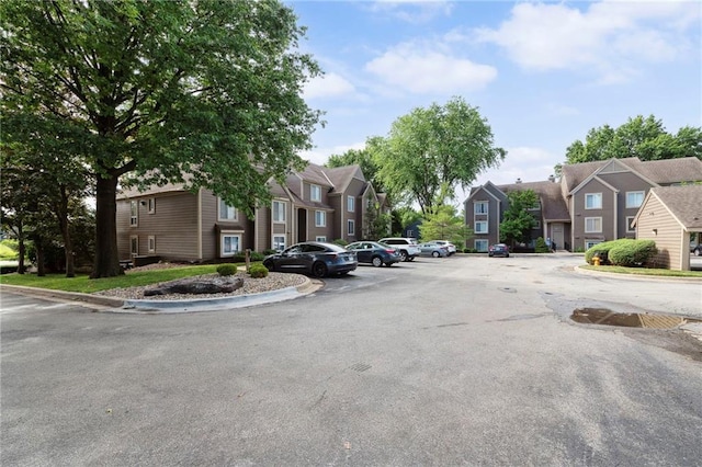 11224 Nieman Rd Unit 302, Overland Park, KS 66210 - view of asphalt road with a residential view and curbs