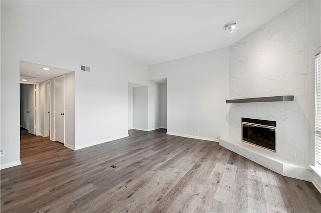 11224 Nieman Rd Unit 302, Overland Park, KS 66210 - unfurnished living room with wood finished floors and a fireplace