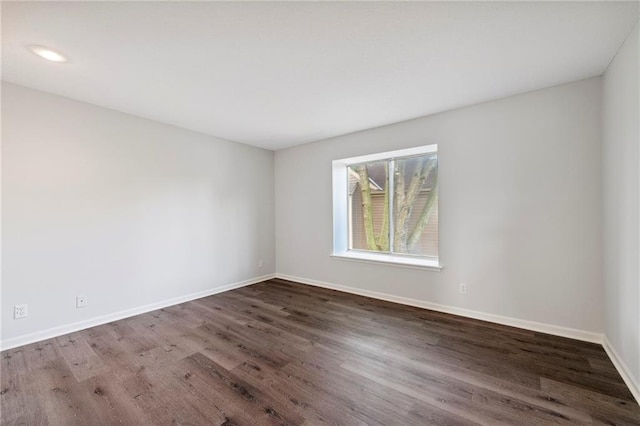 11224 Nieman Rd Unit 302, Overland Park, KS 66210 - empty room featuring wood finished floors and baseboards