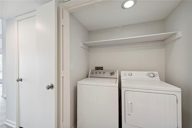 11224 Nieman Rd Unit 302, Overland Park, KS 66210 - laundry area featuring separate washer and dryer