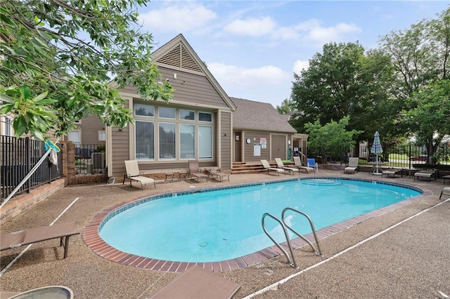 11224 Nieman Rd Unit 302, Overland Park, KS 66210 - community pool with a patio and entry steps
