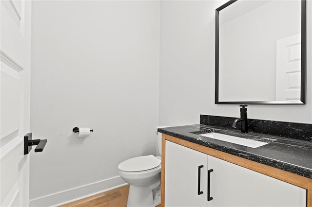 22615 W 87th Ter, Lenexa, KS 66227 - bathroom featuring vanity and wood finished floors