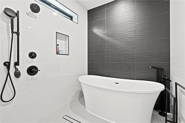 22615 W 87th Ter, Lenexa, KS 66227 - full bathroom with tile walls, a freestanding bath, and tiled shower