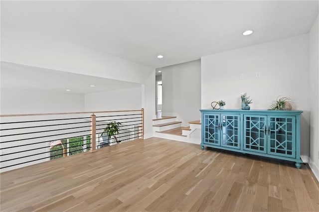 22615 W 87th Ter, Lenexa, KS 66227 - empty room with wood finished floors and recessed lighting