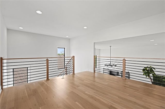 22615 W 87th Ter, Lenexa, KS 66227 - unfurnished room featuring recessed lighting and wood finished floors
