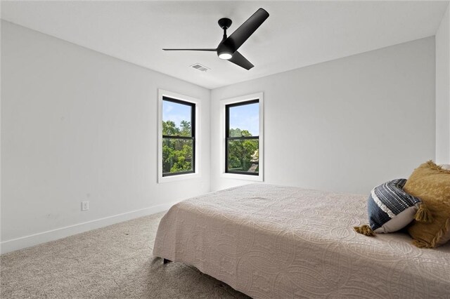 22615 W 87th Ter, Lenexa, KS 66227 - carpeted bedroom featuring baseboards and a ceiling fan
