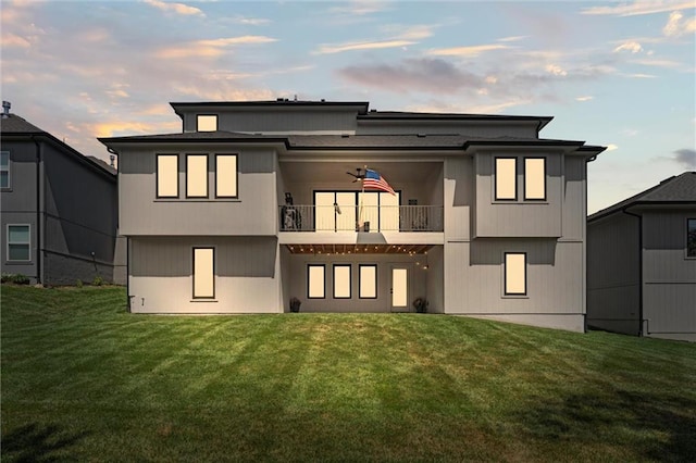 22615 W 87th Ter, Lenexa, KS 66227 - back of house with a balcony and a yard
