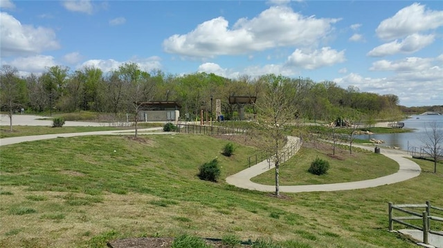 22615 W 87th Ter, Lenexa, KS 66227 - surrounding community with a water view and a lawn