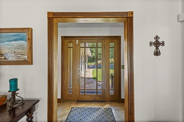 1015 S Wyckford Rd, Olathe, KS 66061 - foyer featuring baseboards and light tile patterned flooring
