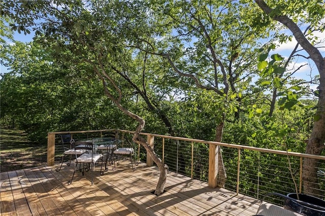 1015 S Wyckford Rd, Olathe, KS 66061 - wooden terrace featuring outdoor dining area