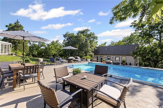 1015 S Wyckford Rd, Olathe, KS 66061 - outdoor pool with outdoor dining space and a patio