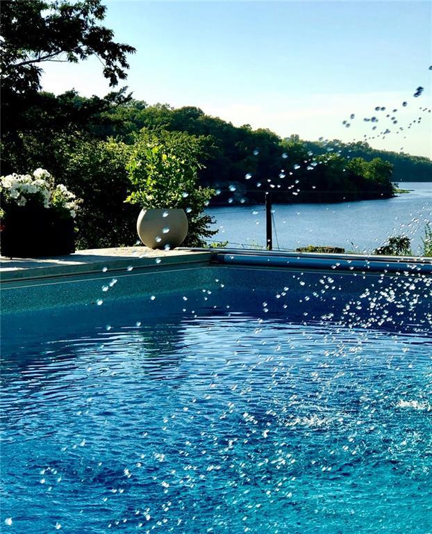 1015 S Wyckford Rd, Olathe, KS 66061 - view of swimming pool featuring a water view