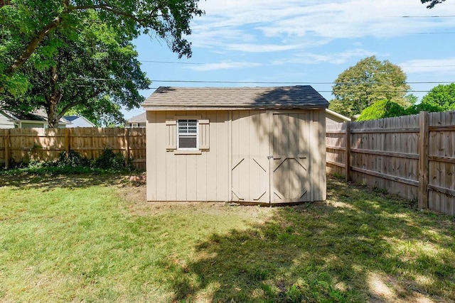 1202 S Willow St, Ottawa, KS 66067 - view of shed featuring a fenced backyard