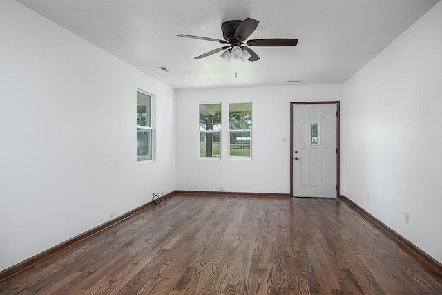 17931 Hollingsworth Rd, Tonganoxie, KS 66086 - unfurnished room featuring dark wood finished floors and ceiling fan