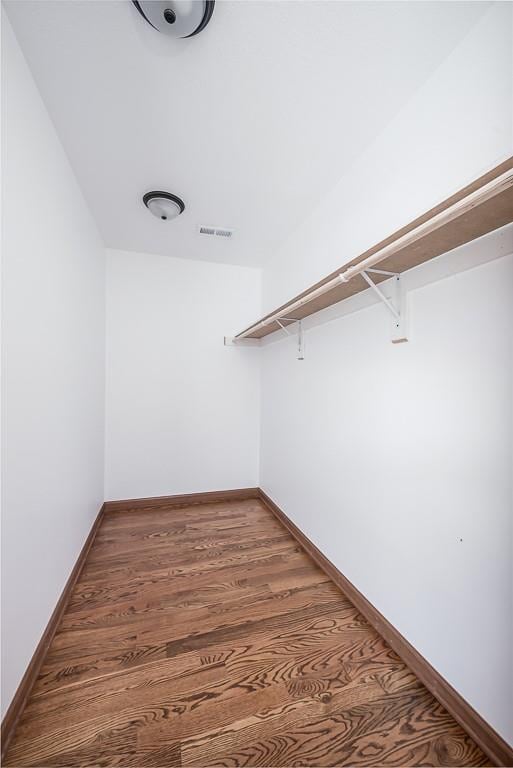 17931 Hollingsworth Rd, Tonganoxie, KS 66086 - spacious closet featuring wood finished floors