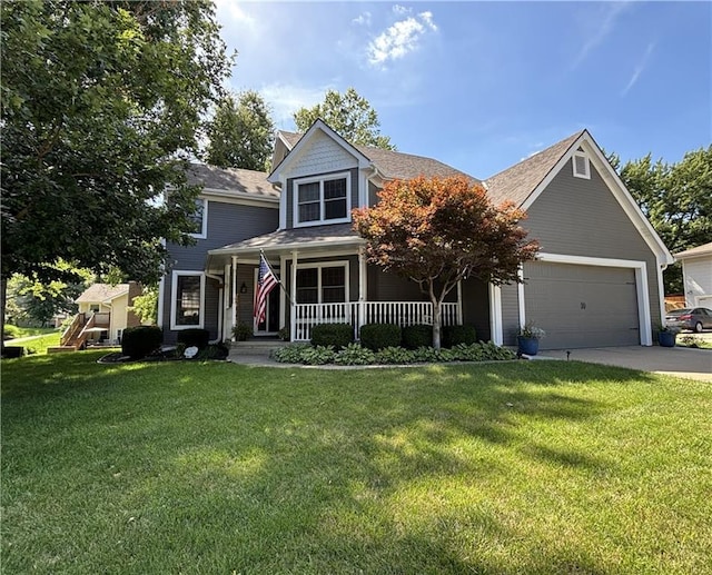 2006 Buckingham St, Saint Joseph, MO 64506 - view of front facade featuring concrete driveway, an attached garage, covered porch, and a front lawn