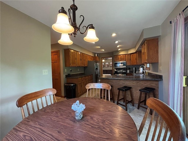 2006 Buckingham St, Saint Joseph, MO 64506 - dining area featuring a chandelier