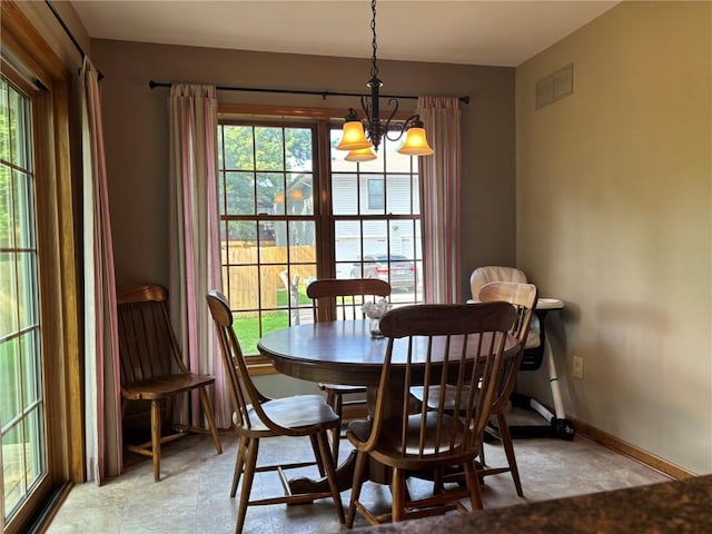 2006 Buckingham St, Saint Joseph, MO 64506 - dining area with a chandelier and baseboards